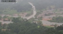 Time-lapse of the Llano River in Texas rapidly flooding a road.