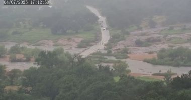 Time-lapse of the Llano River in Texas rapidly flooding a road.