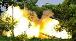 Thai artillery unit firing.