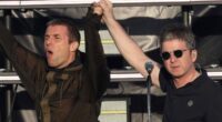 Ticketless Oasis fans 'storm Heaton Park' over fence