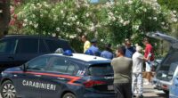 Carabinieri at a car accident scene.