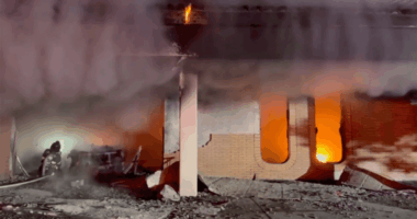 Firefighters battling a fire at a San Jose post office.
