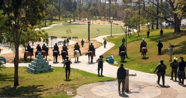 Troops and federal agents briefly descend on LA's MacArthur Park in largely immigrant neighborhood
