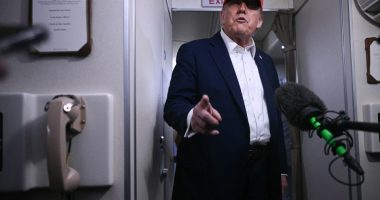 Donald Trump speaking to reporters aboard Air Force One.