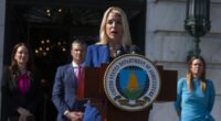 Attorney General Pam Bondi, front, with Agriculture Secretary Brooke Rollins, back left to right, Secretary of Defense Pete Hegseth and Arkansas Gov. Sarah Huckabee Sanders, speaks during a news conference at the Department of Agriculture to rollout the USDA'S National Farm Security Action Plan and discuss actions being taken to protect American agriculture from foreign threats in Washington, Tuesday, July 8, 2025. (AP Photo/Manuel Balce Ceneta)