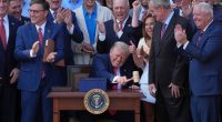 Trump signs his tax and spending cut bill at the White House July 4 picnic