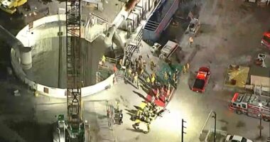 First responders at a collapsed tunnel site.