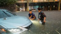 Two die trying to escape New Jersey floods that turned roads to rivers