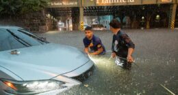 Two die trying to escape New Jersey floods that turned roads to rivers