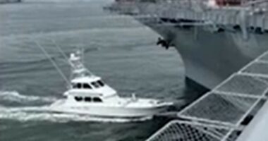 Unbelievable moment boozy boat captain slams into US warship