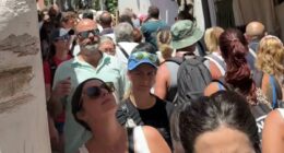 Videos show crowded streets and long queues at Europe holiday hotspots