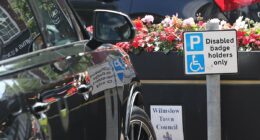 Wayne Rooney leaves his Audi 4x4 in a disabled parking zone