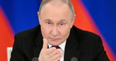 Vladimir Putin speaking at a press conference.
