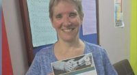 The woman who lost an arm in a lion attack at a Queensland zoo has been identified as New South Wales teacher Jo Cabann.