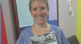 The woman who lost an arm in a lion attack at a Queensland zoo has been identified as New South Wales teacher Jo Cabann.