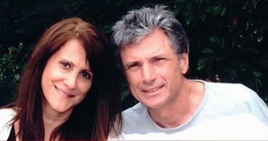 Robin Kaye and her husband, Thomas DeLuca side by side