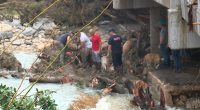 Volunteers search debris in Kerr County.