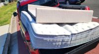 'Nothing wrong with it': Driver baffles police with mattress hanging from ute cab