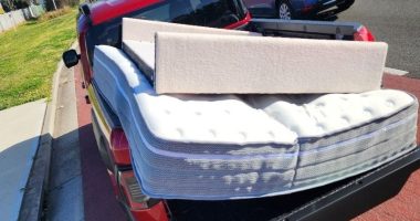 'Nothing wrong with it': Driver baffles police with mattress hanging from ute cab