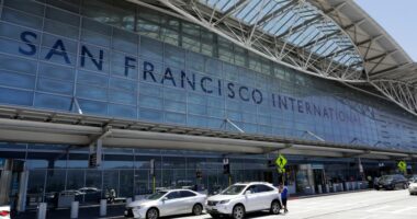 FILE - Vehicles wait outside the international terminal at San Francisco International Airport in San Francisco on July 11, 2017. Two airliners aborted landings at San Francisco International Airport on May 19, 2023, after pilots spotted a Southwest Airlines jet taxiing across runways on which the other planes had been cleared to land. The Federal Aviation Administration said Thursday, May 25, that it reviewed the matter and determined that appropriate steps were taken to ensure safety. (AP Photo/Marcio Jose Sanchez, File)