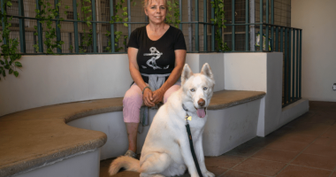 Riley with his adopter on the day he went home.