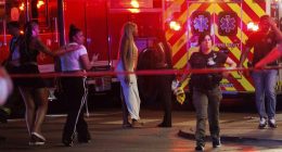Drive-by shooting leaves four dead and 14 wounded, police say