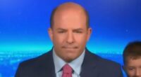 Hilarious moment CNN media analyst's five-year-old son gatecrashes dad's live TV interview