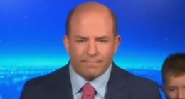 Hilarious moment CNN media analyst's five-year-old son gatecrashes dad's live TV interview