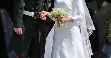 Prince Harry and Meghan Markle share a kiss outside St George's Chapel on their wedding day