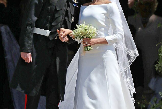 Prince Harry and Meghan Markle share a kiss outside St George's Chapel on their wedding day