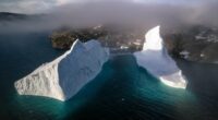 Huge iceberg drifting dangerously close to shore in Greenland