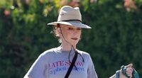 Kathy Griffin shows off VERY taut face as she tames her wild-hair look