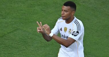 Kylian Mbappe dedicates stunning scissor-kick to Diogo Jota as Real Madrid survive late scare to beat Borussia Dortmund in thriller after THREE goals in added time- and set up crunch semi-final clash with PSG