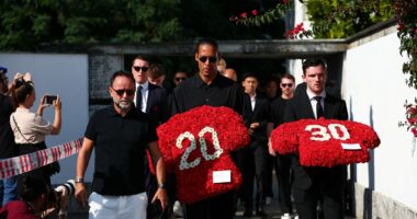 Liverpool squad applauded by crowds as Virgil van Dijk and Andrew Robertson arrive to Diogo Jota's funeral with wreaths to pay respect after team-mate's tragic death