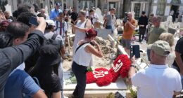 Police are called in as Diogo Jota's graveside is flooded by fans who start snapping 'disrespectful' photos