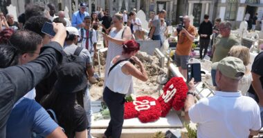Police are called in as Diogo Jota's graveside is flooded by fans who start snapping 'disrespectful' photos
