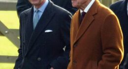 Charles with Philip on Christmas morning in December 2003. Philip allegedly felt Charles lacked the 'dedication necessary to make a good king'