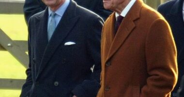 Charles with Philip on Christmas morning in December 2003. Philip allegedly felt Charles lacked the 'dedication necessary to make a good king'