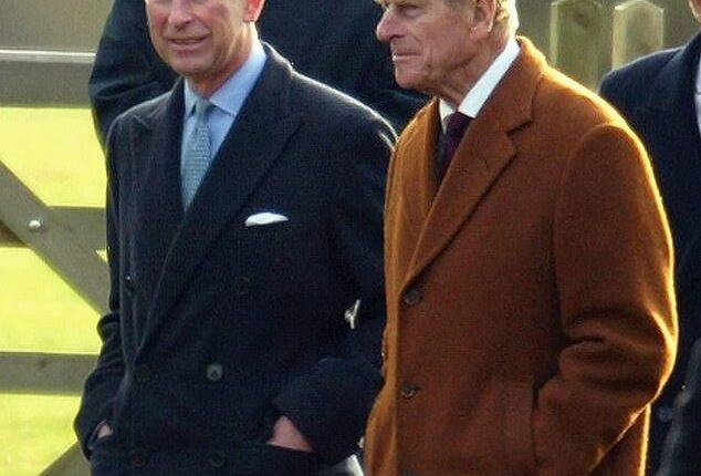 Charles with Philip on Christmas morning in December 2003. Philip allegedly felt Charles lacked the 'dedication necessary to make a good king'