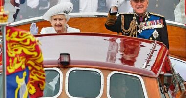 Queen Elizabeth II and Prince Philip wave to onlookers during a pageant in celebration of the Queen's Diamond Jubilee along the River Thames in June 2012. Philip ended up in hospital after he refused to sit down during Queen Elizabeth II's Diamond Jubilee celebrations due to fears he would look like 'Mr Beckham'