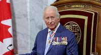 King Charles sits on the throne in the Senate Chamber for the State Opening of Parliament during an official visit to Canada on May 27, 2025 in Ottawa, Ontario