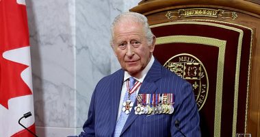 King Charles sits on the throne in the Senate Chamber for the State Opening of Parliament during an official visit to Canada on May 27, 2025 in Ottawa, Ontario