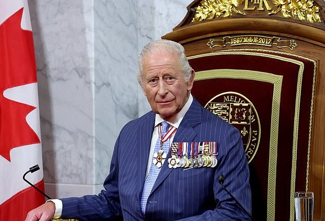 King Charles sits on the throne in the Senate Chamber for the State Opening of Parliament during an official visit to Canada on May 27, 2025 in Ottawa, Ontario