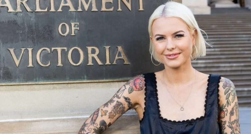 Tattooed former stripper turned politician is expecting her first child with RIVAL Labor MP