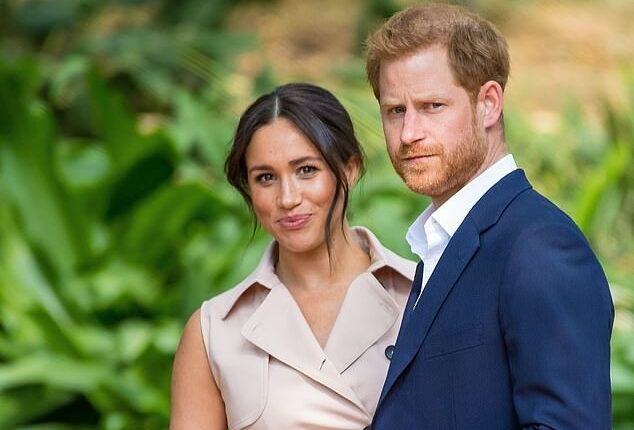 Author Tom Quinn claims that Meghan Markle caused a panic during her brief time as a working member of the family when she signaled she wanted to operate separately from the Queen. Here, she is pictured with Prince Harry