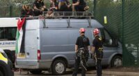 Three women are arrested on terror offences after van slammed into defence manufacturer