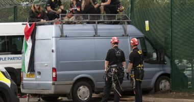 Three women are arrested on terror offences after van slammed into defence manufacturer
