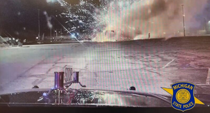 A still image from video posted by Michigan State Police shows a fire at a Haring Township firework tent. (Courtesy Michigan State Police)