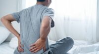 'I'm a sleep expert - this is how to sleep better if you suffer from a bad back'