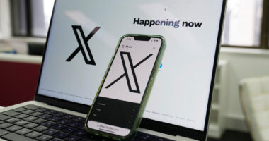 Musk says he plans to sue Apple for not featuring X or Grok among its top apps